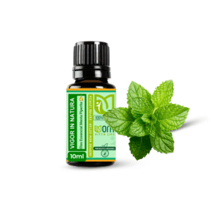 Frasco ambar com óleo essencial menta piperita da Objetivo Magra ao lado do ramo de hortelâ